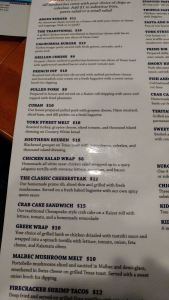 A photograph of the sandwich section of York Street Grille's menu. This section represents about one fourth of their total menu.